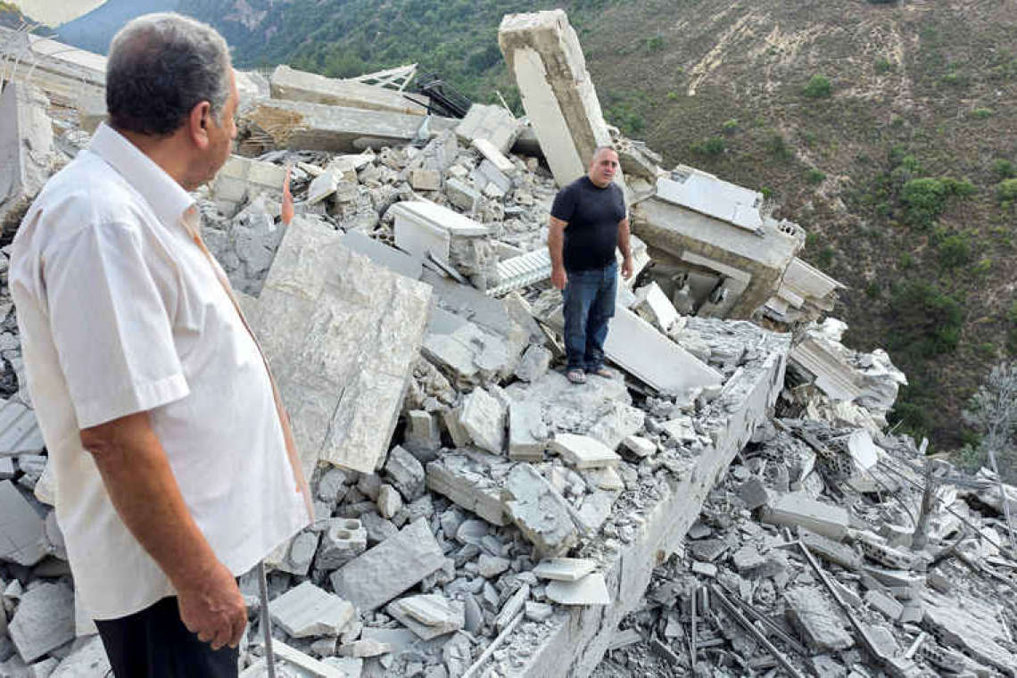 Israeli strikes on southern Lebanese town kill 12 people as fears of escalation mount